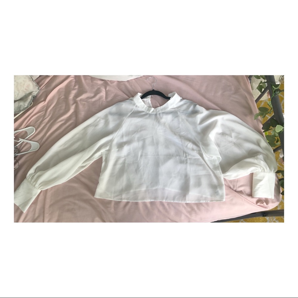 Cropped white blouse.